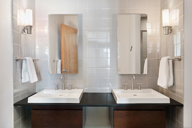 33 N Water St Unit 505, Norwalk, CT 06854 - full bathroom featuring double vanity, tile walls, and decorative backsplash