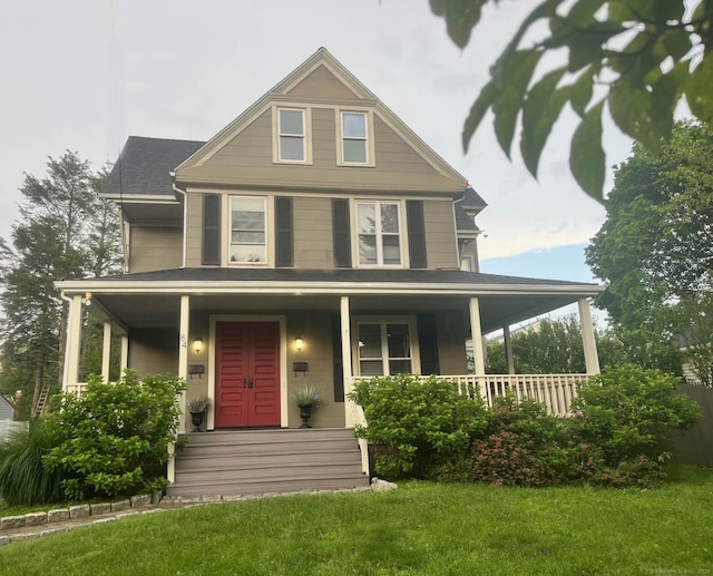84 Strawberry Hill Ave, Norwalk, CT 06855 - view of front facade with covered porch and a front lawn