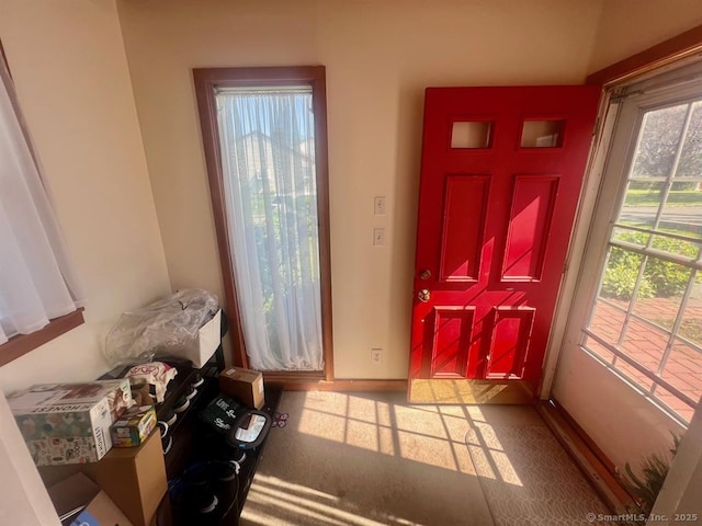 32 Beaver Hill Rd, Greenburgh, NY 10523 - entryway with carpet flooring and baseboards