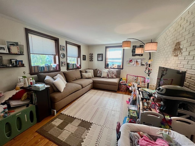 32 Beaver Hill Rd, Greenburgh, NY 10523 - living area with wood finished floors, ornamental molding, and a brick fireplace