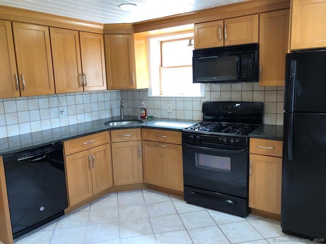32 Beaver Hill Rd, Greenburgh, NY 10523 - kitchen featuring black appliances, dark stone counters, and backsplash
