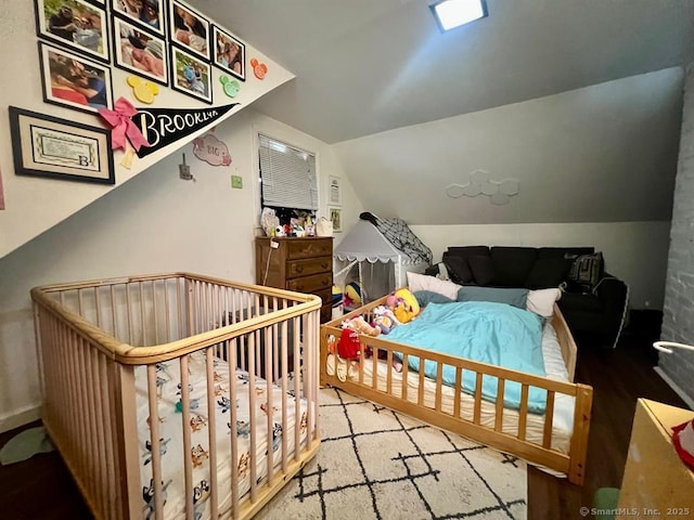 32 Beaver Hill Rd, Greenburgh, NY 10523 - bedroom with lofted ceiling and wood finished floors