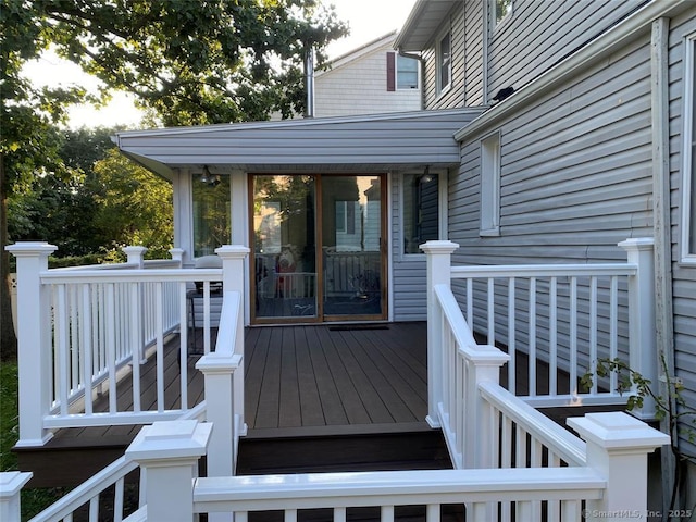 32 Beaver Hill Rd, Greenburgh, NY 10523 - wooden terrace with a sunroom