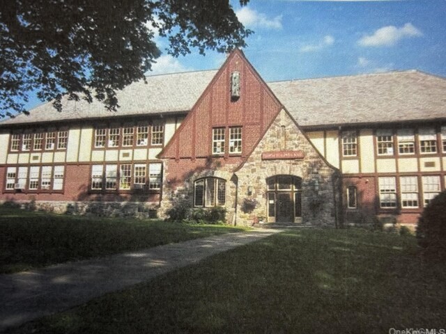 32 Beaver Hill Rd, Greenburgh, NY 10523 - english style home featuring stone siding and a front yard
