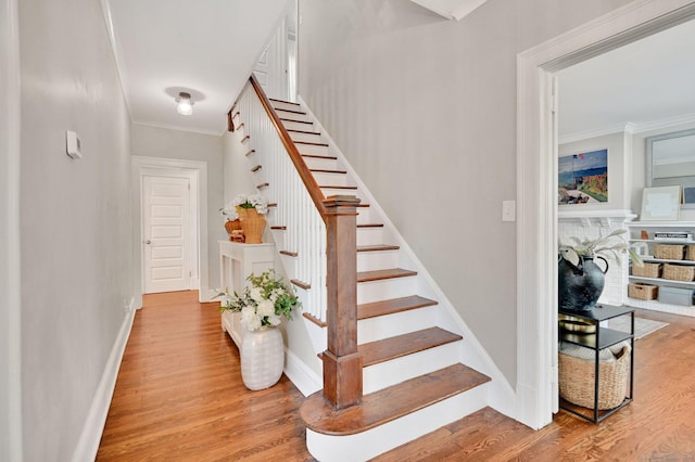 1676 Boulevard Blvd, West Hartford, CT 06107 - stairway featuring ornamental molding and wood finished floors