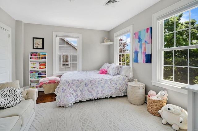 1676 Boulevard Blvd, West Hartford, CT 06107 - bedroom featuring multiple windows and wood finished floors