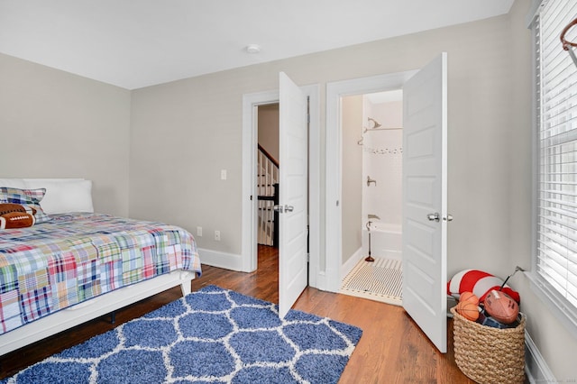 1676 Boulevard Blvd, West Hartford, CT 06107 - bedroom with wood finished floors and multiple windows