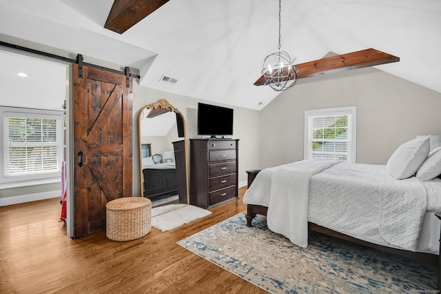 1676 Boulevard Blvd, West Hartford, CT 06107 - bedroom featuring a barn door, wood finished floors, and a chandelier