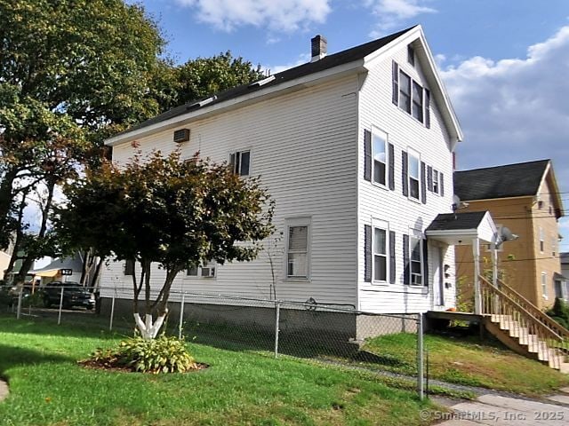 267 Chapman St, New Britain, CT 06051 - view of side of home featuring a chimney