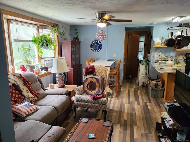 267 Chapman St, New Britain, CT 06051 - living room featuring a ceiling fan, wood finished floors, and a textured ceiling