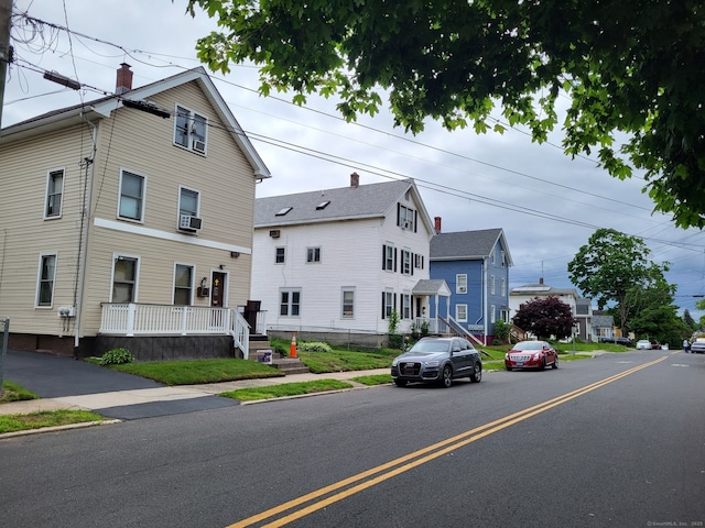 267 Chapman St, New Britain, CT 06051 - view of front of property featuring cooling unit and a porch
