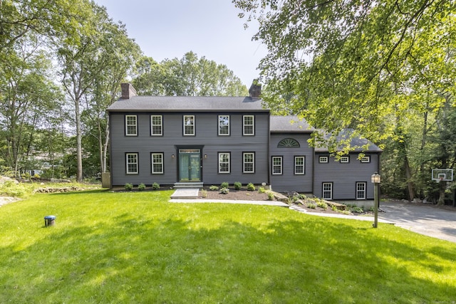 17 Kathleen Dr, Stratford, CT 06614 - colonial-style house featuring a chimney and a front yard