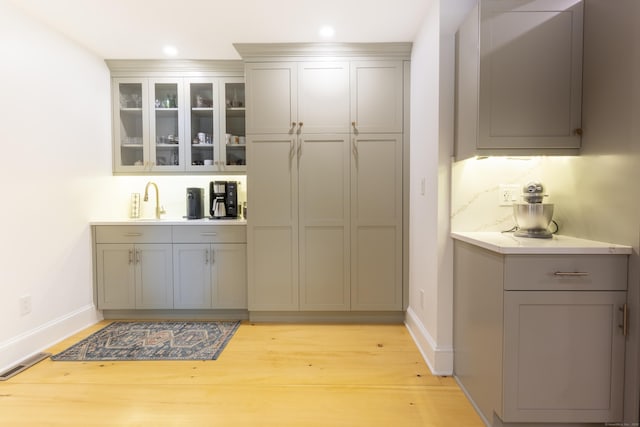 17 Kathleen Dr, Stratford, CT 06614 - indoor wet bar with light wood-style floors and recessed lighting
