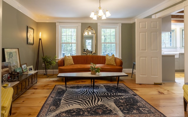 17 Kathleen Dr, Stratford, CT 06614 - living room with a chandelier, light wood-style flooring, and crown molding