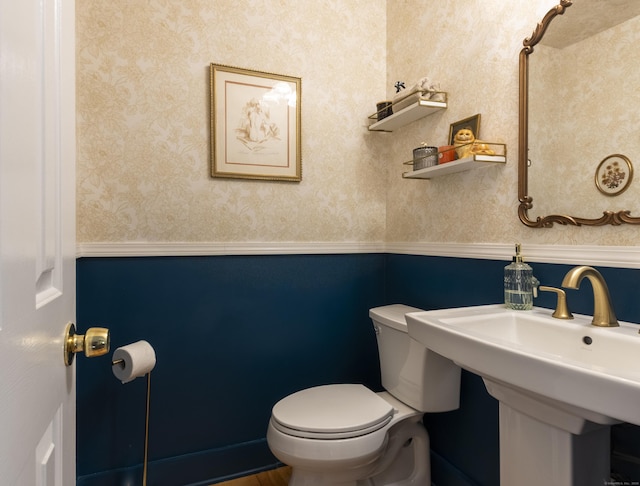17 Kathleen Dr, Stratford, CT 06614 - bathroom with a wainscoted wall and wallpapered walls