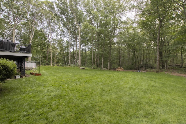 17 Kathleen Dr, Stratford, CT 06614 - view of green lawn featuring a wooden deck