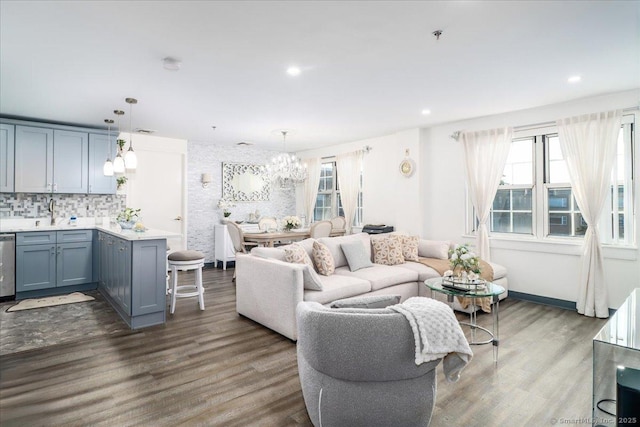 59 Courtland Ave Apt 3Q, Stamford, CT 06902 - living area with a chandelier, healthy amount of natural light, wood finished floors, and recessed lighting