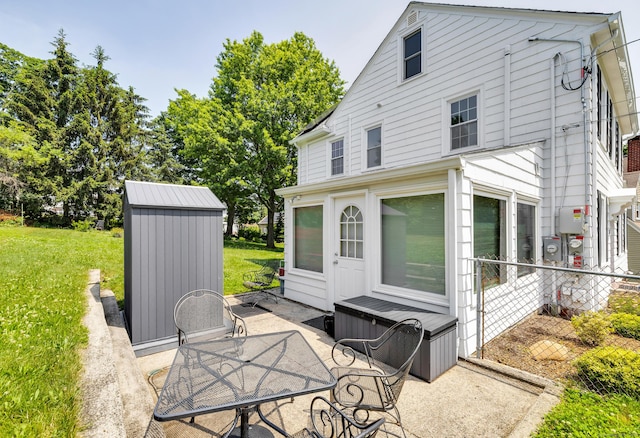 35 Brower St, West Haven, CT 06516 - view of patio featuring a storage unit