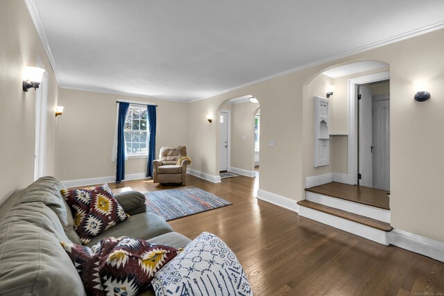 35 Brower St, West Haven, CT 06516 - living area with arched walkways, wood finished floors, and ornamental molding