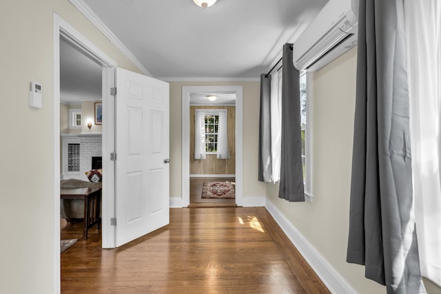 35 Brower St, West Haven, CT 06516 - hall with a wall mounted AC, wood finished floors, and crown molding