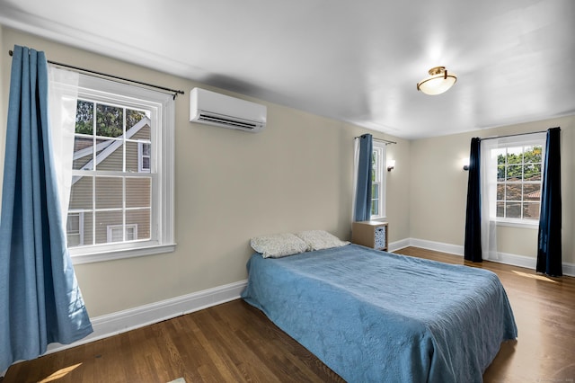 35 Brower St, West Haven, CT 06516 - bedroom featuring a wall mounted air conditioner and wood finished floors