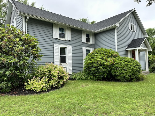 68 Main St, Somers, CT 06071 - view of side of property featuring a yard and roof with shingles