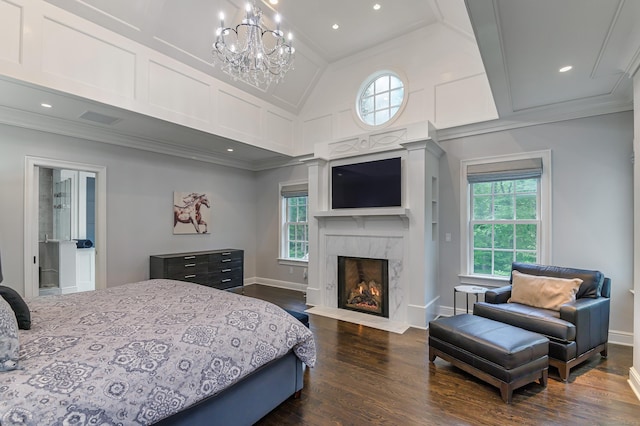 319 Mountain Rd, Wilton, CT 06897 - bedroom featuring crown molding, a chandelier, dark wood finished floors, a high end fireplace, and vaulted ceiling