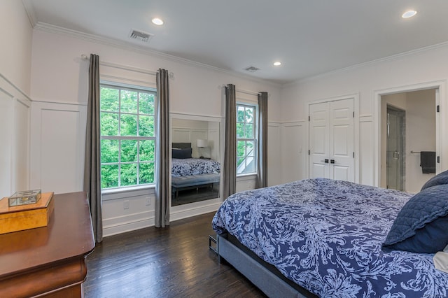 319 Mountain Rd, Wilton, CT 06897 - bedroom with multiple windows, ornamental molding, a decorative wall, and dark wood-style flooring