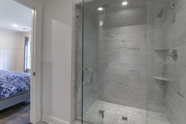 319 Mountain Rd, Wilton, CT 06897 - ensuite bathroom featuring a shower stall, crown molding, recessed lighting, and wood finished floors