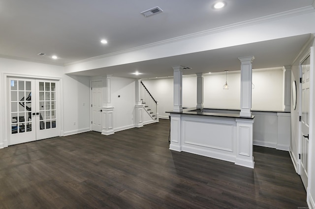 319 Mountain Rd, Wilton, CT 06897 - basement with dark wood-type flooring, recessed lighting, crown molding, french doors, and stairway