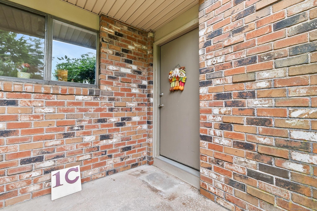 1 Amato Dr Apt C, South Windsor, CT 06074 - property entrance with brick siding