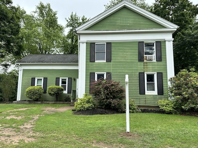 74 Main St, Somers, CT 06071 - neoclassical / greek revival house featuring a front yard and cooling unit