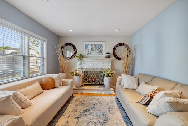 53 Daytona St, West Haven, CT 06516 - living area featuring wood finished floors, recessed lighting, and a fireplace