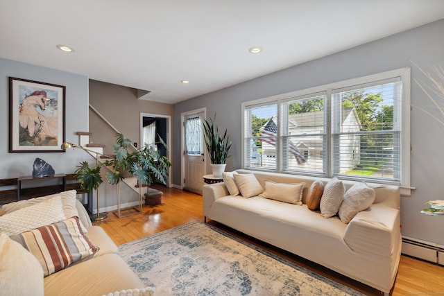 53 Daytona St, West Haven, CT 06516 - living room with baseboard heating, recessed lighting, and wood finished floors