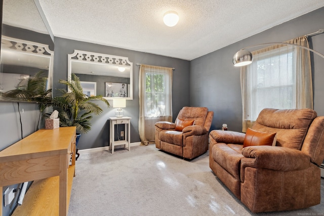 53 Daytona St, West Haven, CT 06516 - living area with a textured ceiling and carpet