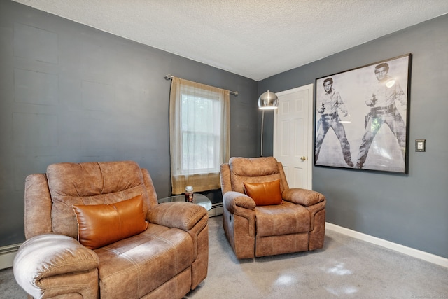 53 Daytona St, West Haven, CT 06516 - sitting room featuring a baseboard heating unit and a textured ceiling
