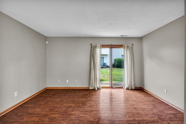 410 Emmett St Unit 45, Bristol, CT 06010 - spare room with wood finished floors and a textured ceiling