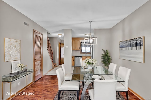 410 Emmett St Unit 45, Bristol, CT 06010 - dining area with wood finished floors and a chandelier