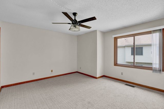 410 Emmett St Unit 45, Bristol, CT 06010 - spare room with light colored carpet, ceiling fan, and a textured ceiling