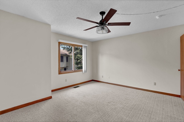 410 Emmett St Unit 45, Bristol, CT 06010 - carpeted empty room with ceiling fan, a textured ceiling, and a smoke detector