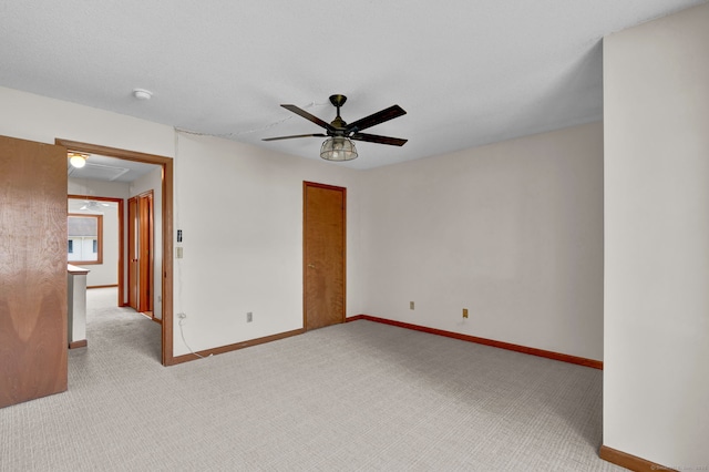 410 Emmett St Unit 45, Bristol, CT 06010 - empty room featuring attic access, light carpet, a ceiling fan, and a smoke detector