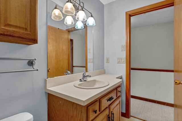 410 Emmett St Unit 45, Bristol, CT 06010 - half bathroom featuring vanity and a chandelier