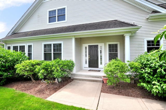 20 Carnoustie Cir, Bloomfield, CT 06002 - view of exterior entry with roof with shingles