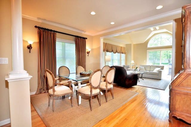 20 Carnoustie Cir, Bloomfield, CT 06002 - dining room with decorative columns, light wood finished floors, recessed lighting, crown molding, and vaulted ceiling