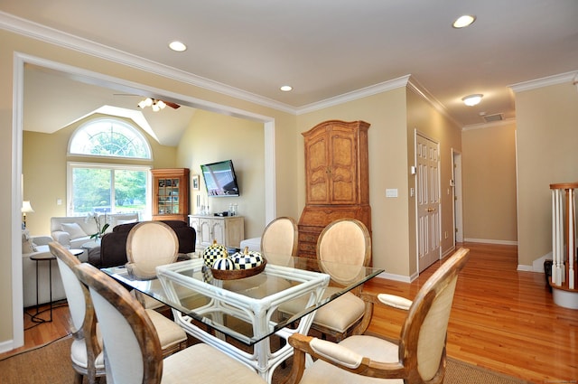 20 Carnoustie Cir, Bloomfield, CT 06002 - dining room with light wood-style flooring, ceiling fan, vaulted ceiling, recessed lighting, and ornamental molding