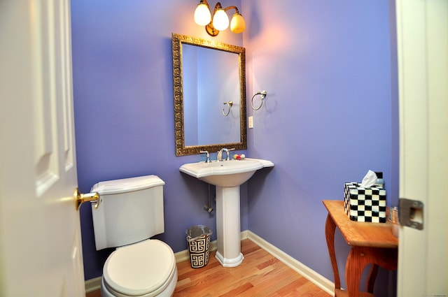 20 Carnoustie Cir, Bloomfield, CT 06002 - half bathroom with wood finished floors and baseboards