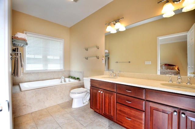 20 Carnoustie Cir, Bloomfield, CT 06002 - ensuite bathroom featuring tile patterned floors, double vanity, and a bath