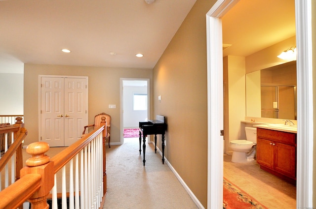 20 Carnoustie Cir, Bloomfield, CT 06002 - hallway with an upstairs landing, recessed lighting, and light carpet
