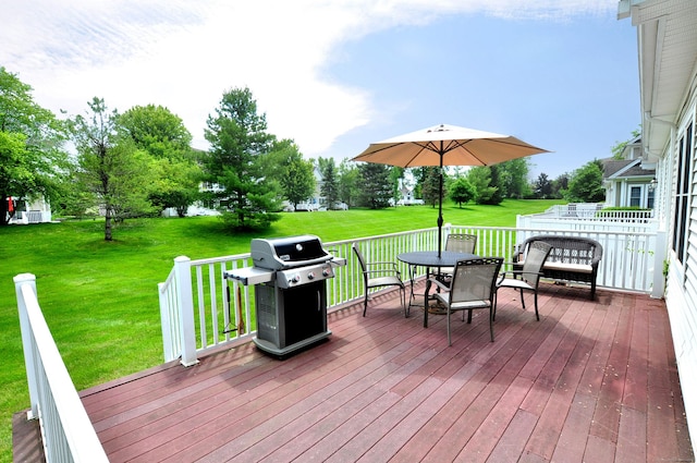 20 Carnoustie Cir, Bloomfield, CT 06002 - wooden deck featuring area for grilling, outdoor dining space, and a lawn