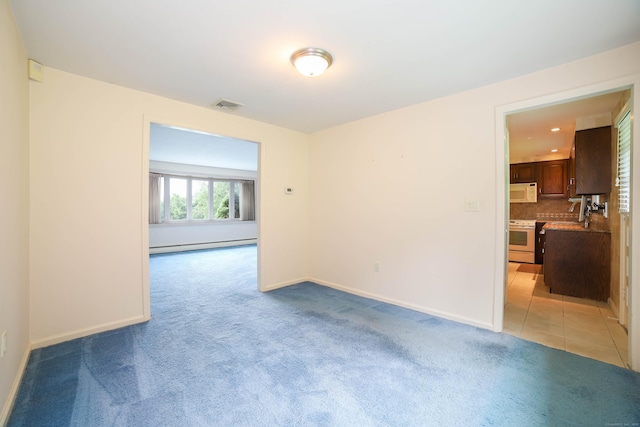 57 Apple Tree Ln, Hamden, CT 06518 - unfurnished room featuring light carpet and a baseboard radiator